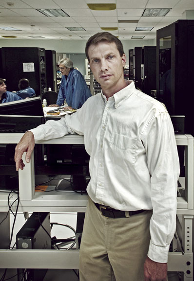 Glenn Rakow in lab cover